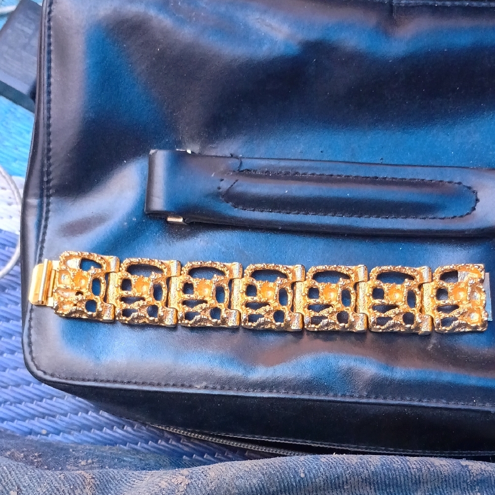 Gold Bracelet with Black Bag